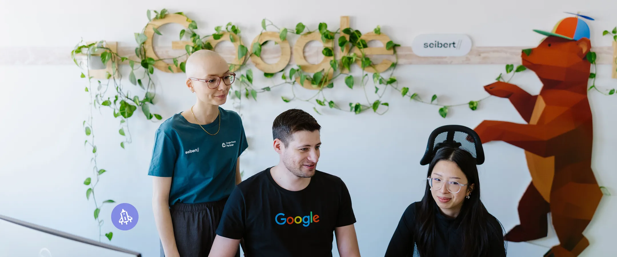 four people sitting at a table