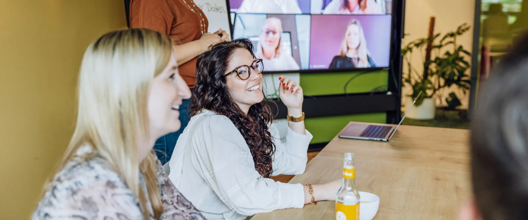 woman sitting and smiling