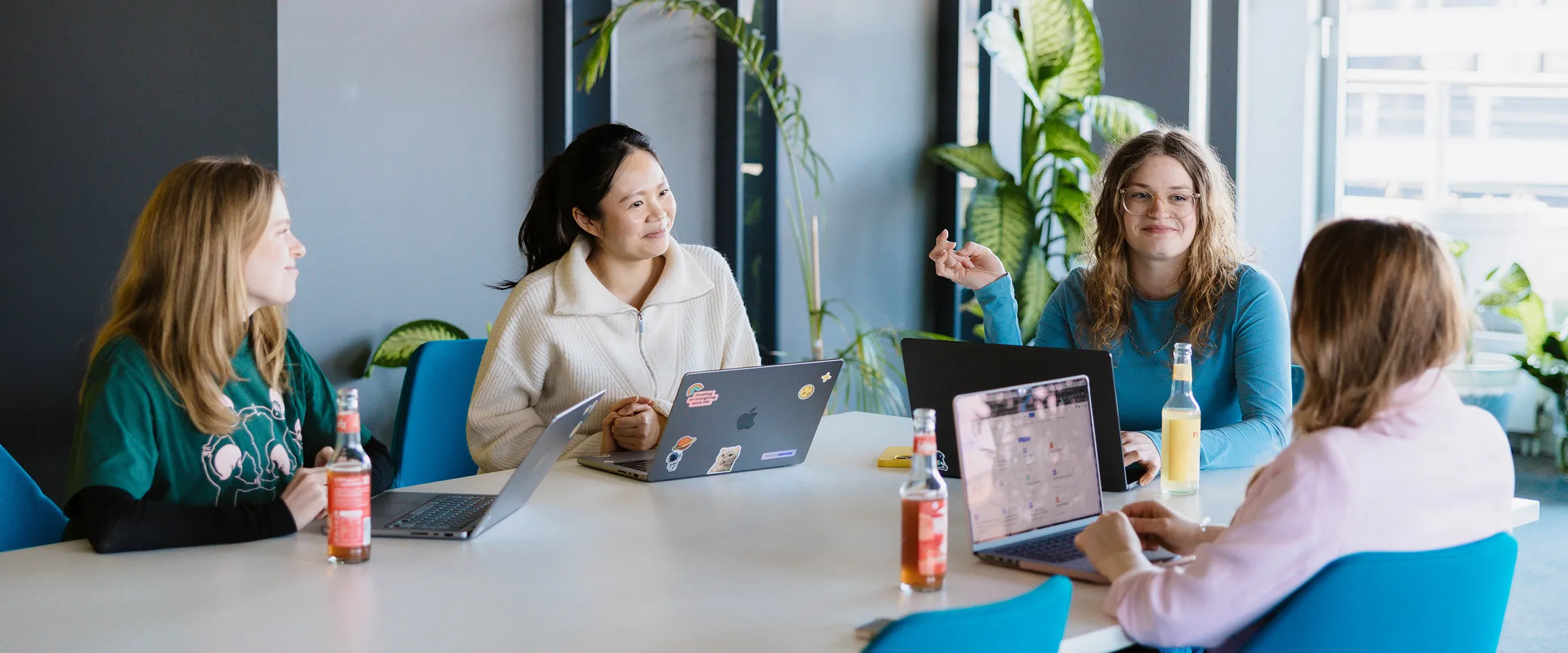 group of people talking at a table