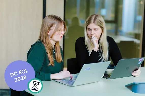 IT administrator reviewing Atlassian Data Center migration timeline on a laptop