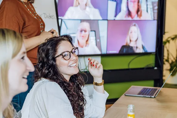 woman sitting and smiling