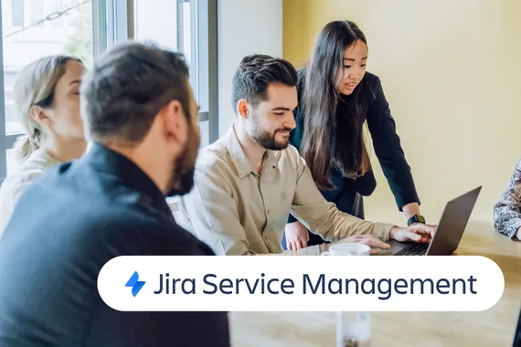 group of employees sitting at a table with the Jira Service Management logo in the foreground
