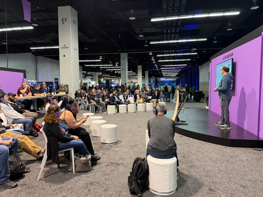 A Seibert talk drawing a crowd on the Atlassian stage at Team '26