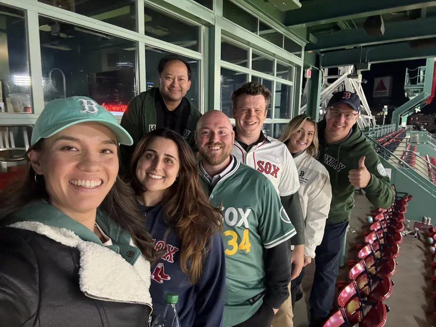 Seibert team members at a Red Sox game at Fenway Park